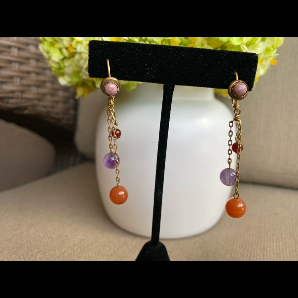 Dangle earrings in antique metal. 2 1/2 “ in long